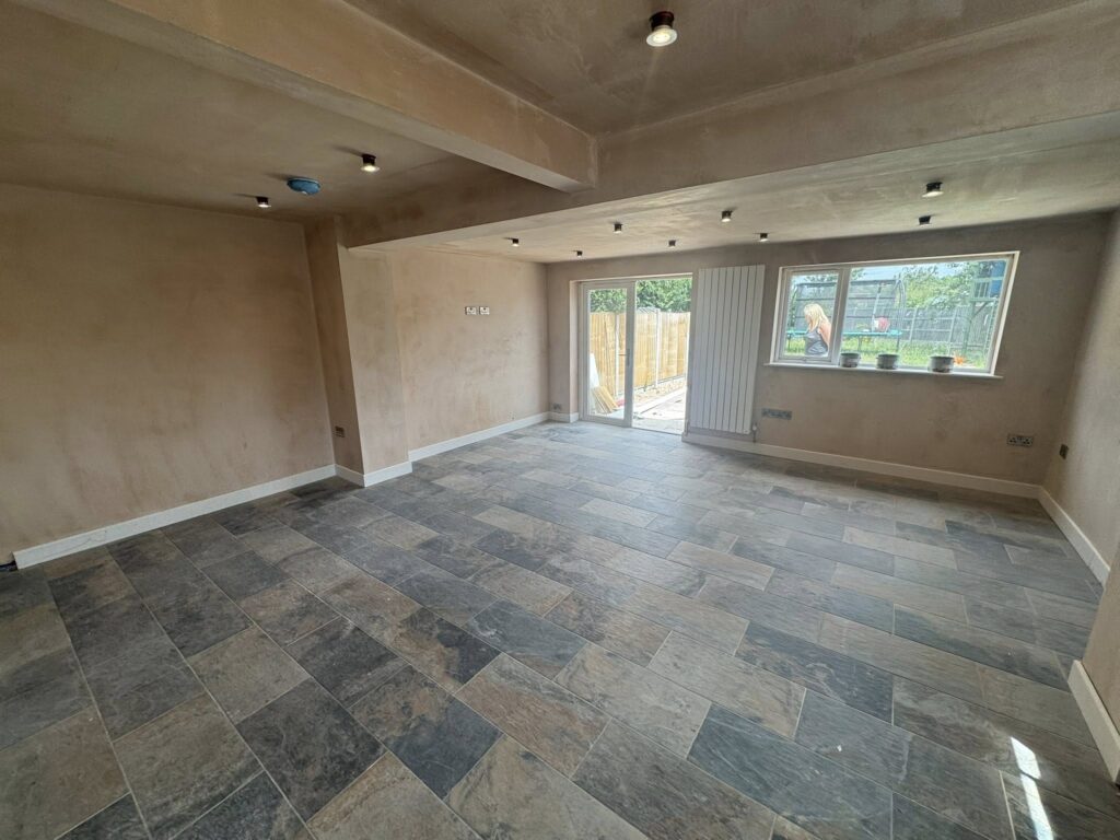 Ceramic tiling work in Lincoln showing newly installed tiled flooring during property renovation