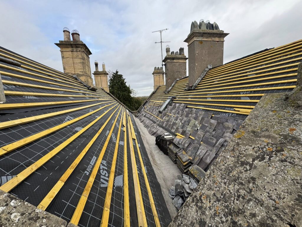 Roofing repair on listed building in Lincolnshire with heritage roof restoration work