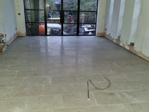 Ceramic tiling in living room in Lincolnshire showing newly installed tiled floor finish